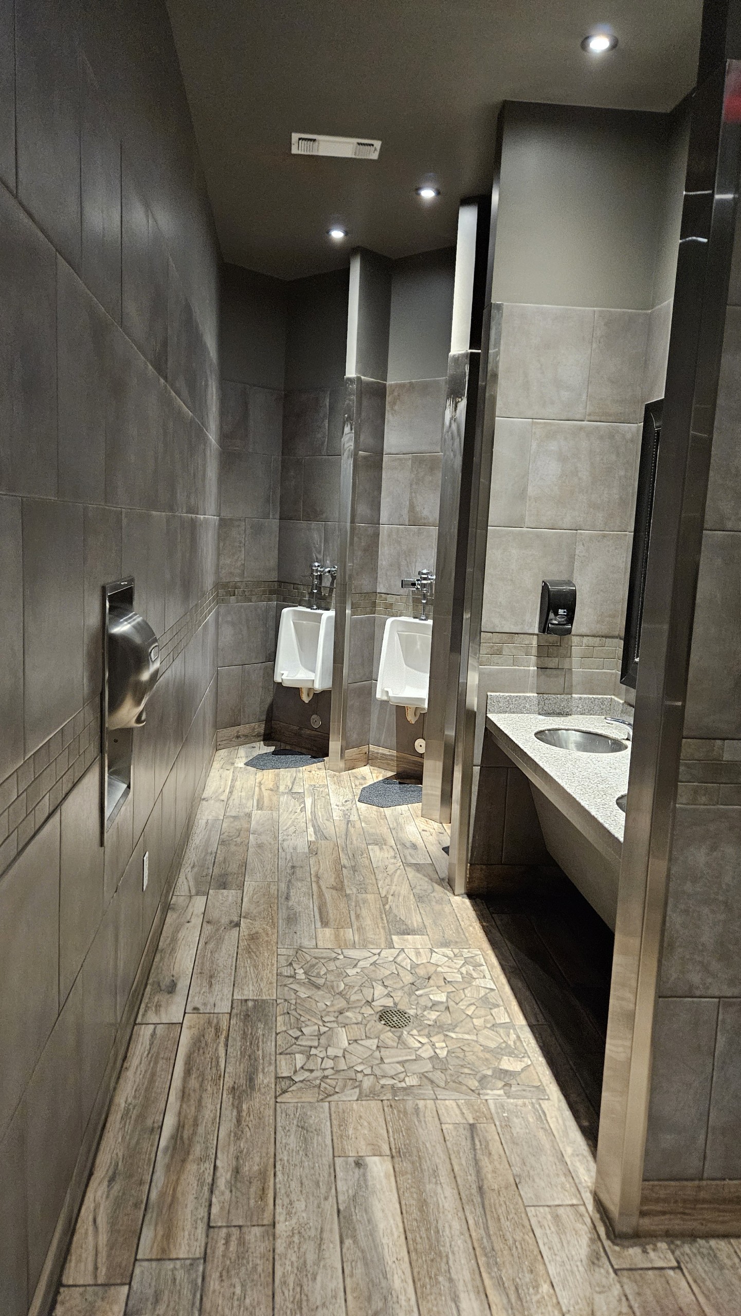 Clean modern restrooms with tile floors